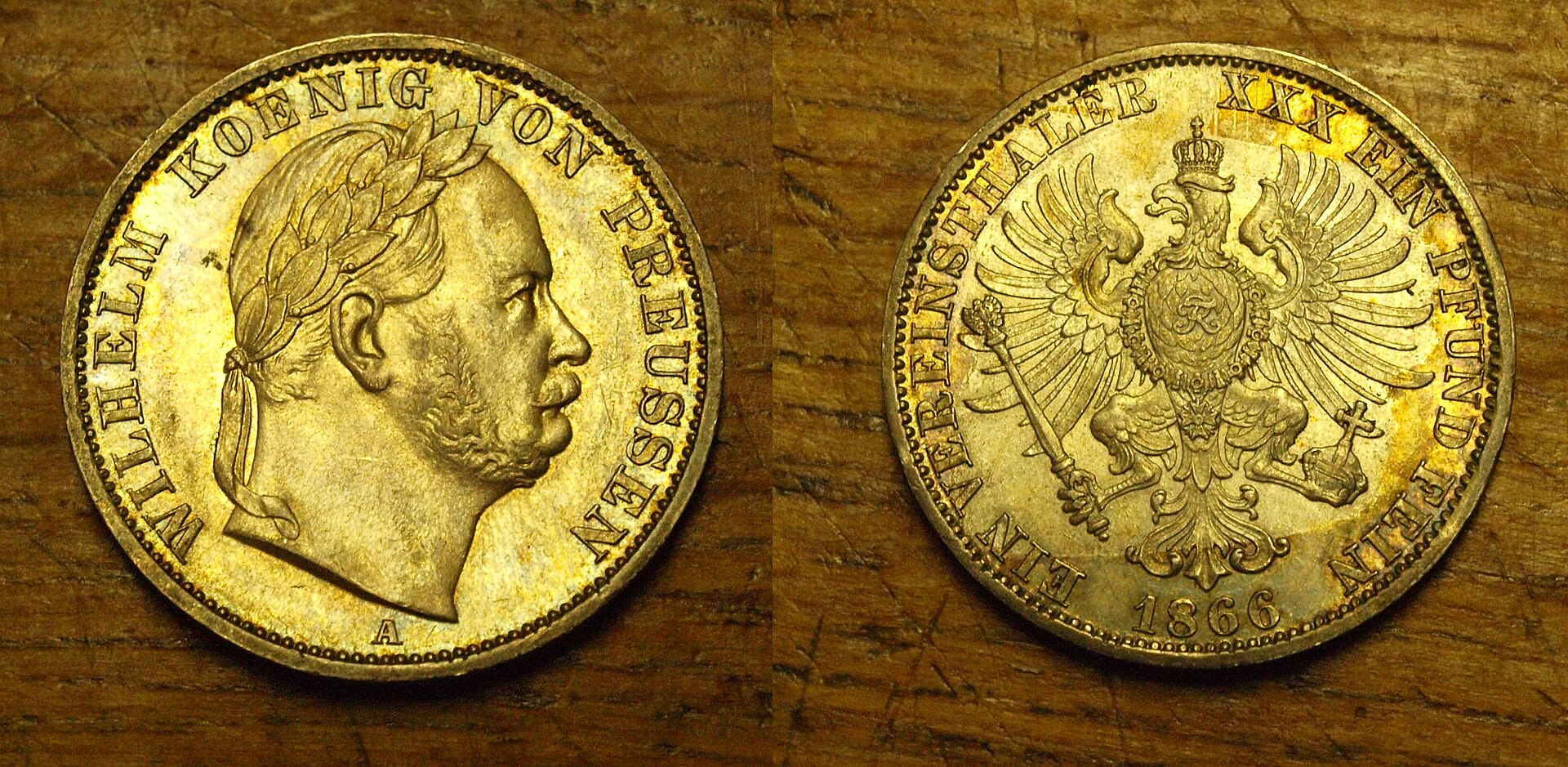 Imagem de referência relacionada a Vereinsthaler, item descrito como unidade monetária da maioria dos Estados alemães, bem como da Áustria e de Liechtenstein na segunda metade do século XIX
